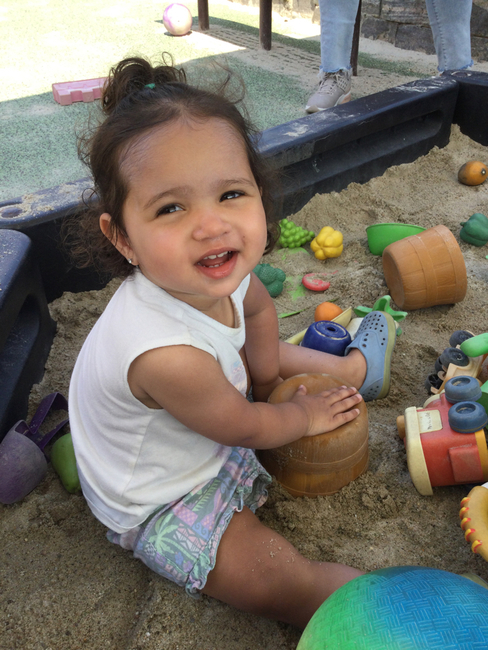 child in sandbox